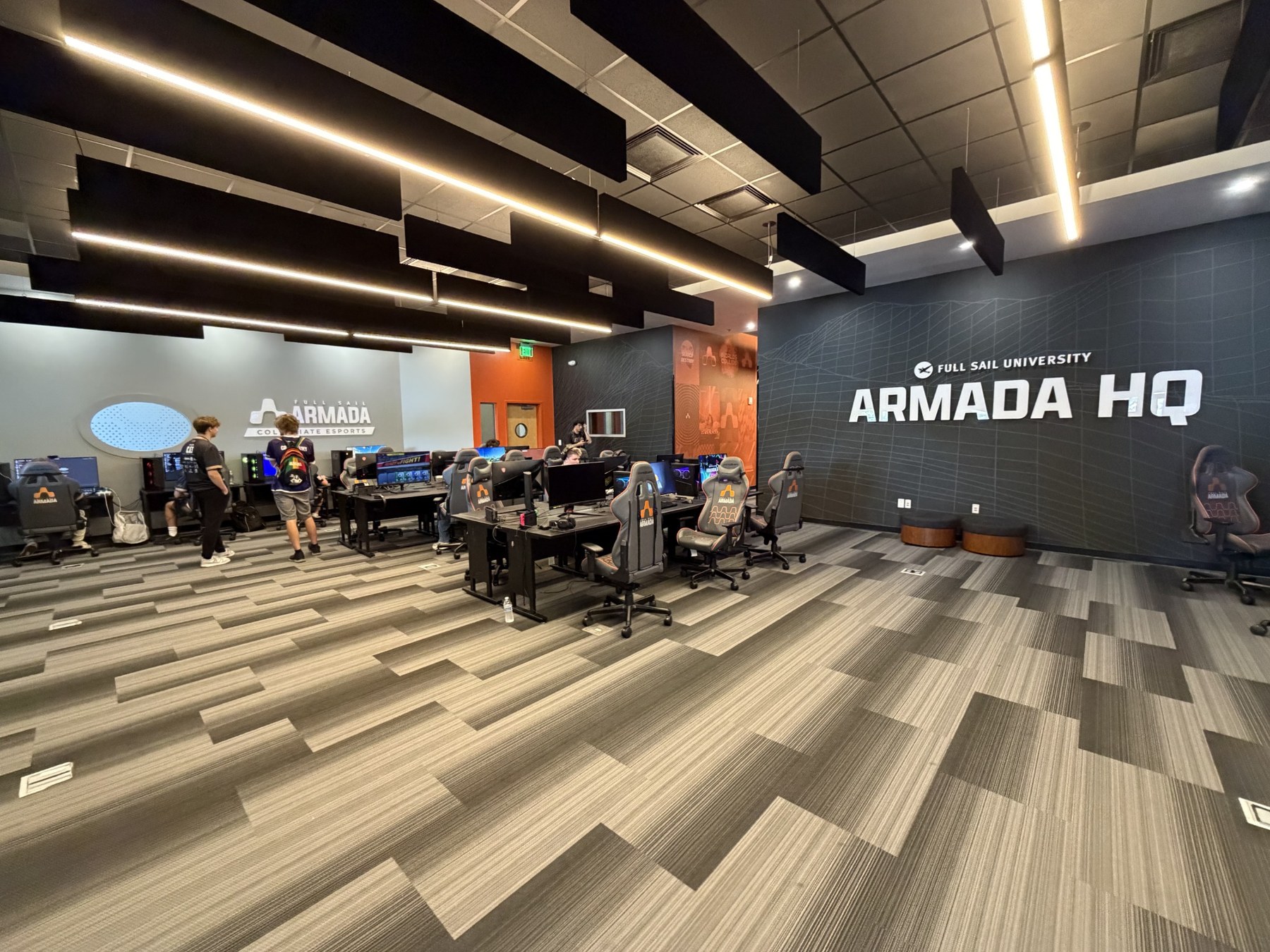 Armada HQ esports room with rows of gaming stations