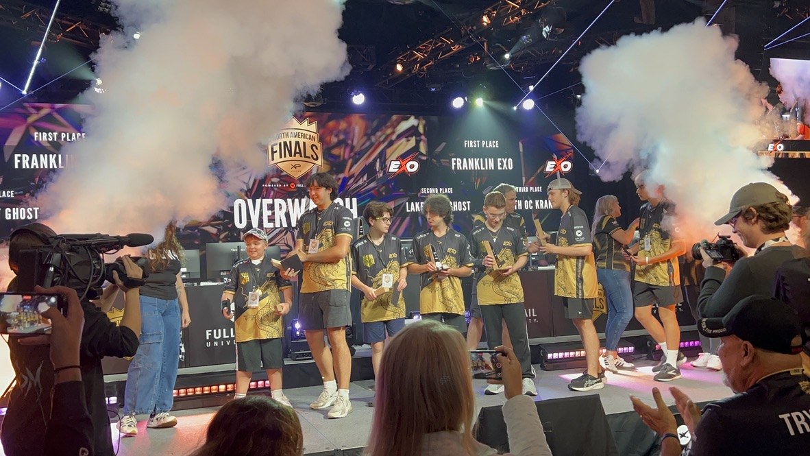 STORM players receiving awards on stage during the Overwatch finals ceremony